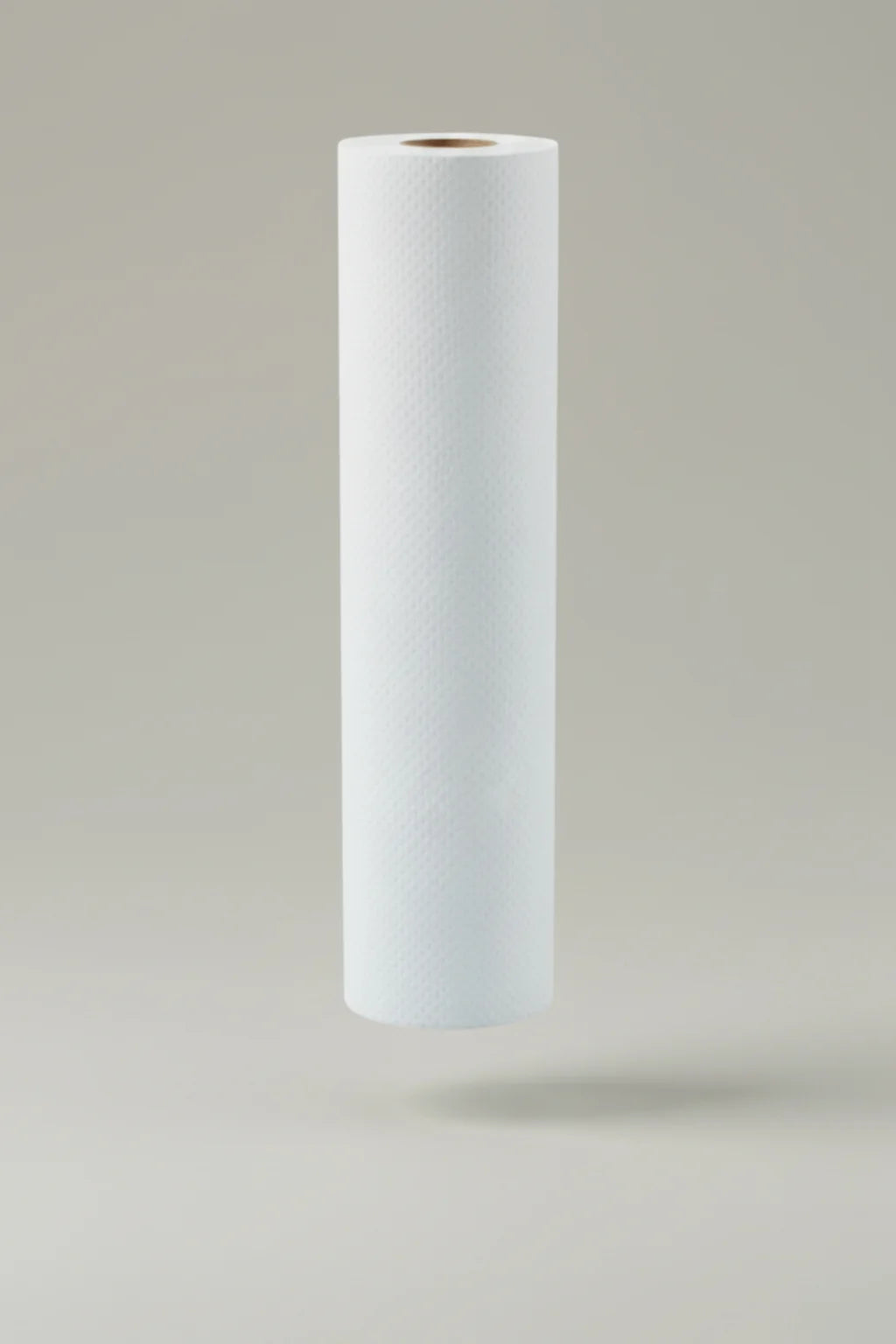 White cylindrical bed roll  on a gray backgroundissue paper