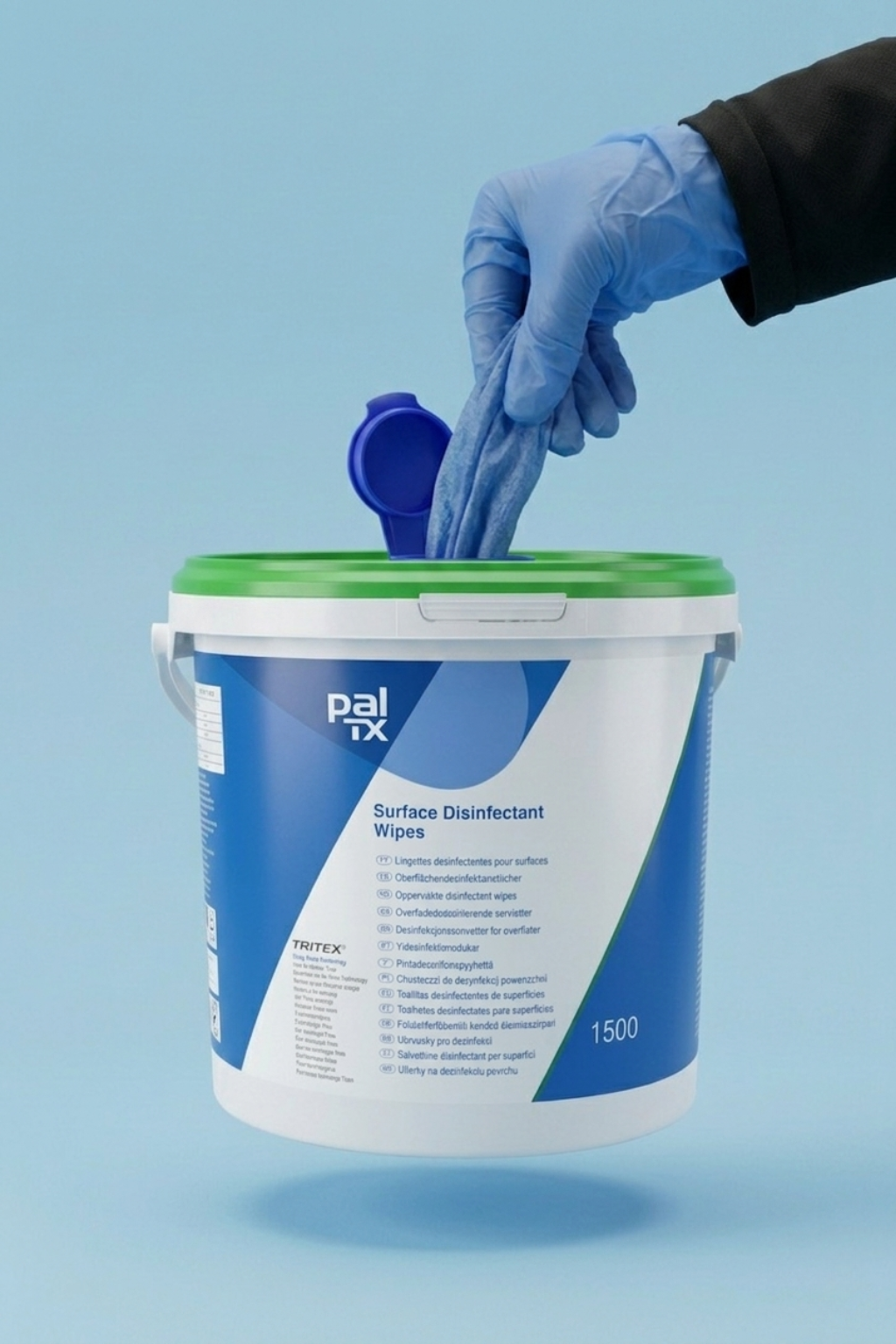 Person wearing blue gloves taking a surface disinfectant wipe from a container labeled 'Pal RX'.