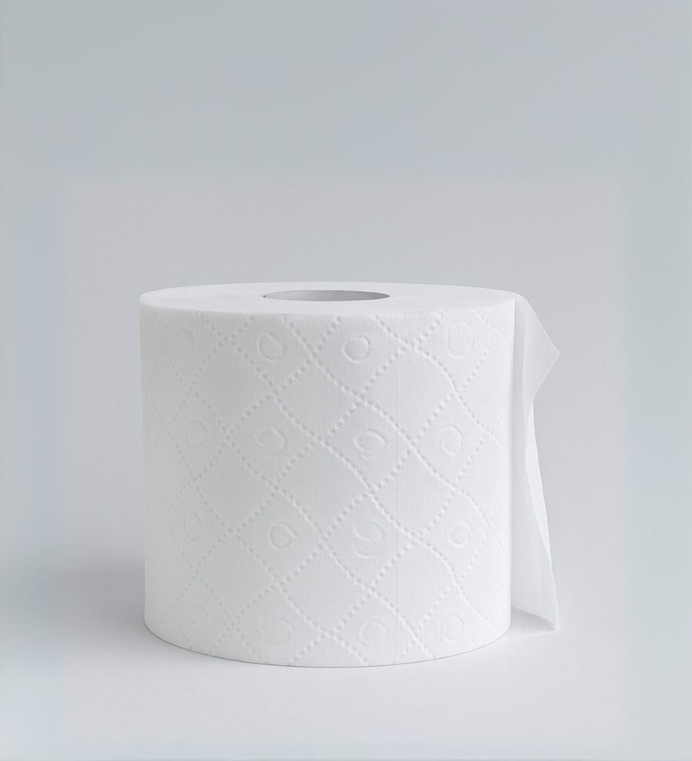 White roll of toilet paper on a light gray background